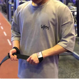 https://athlora.ca › products › mens-gym-oversized-shirt

