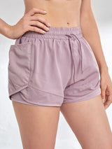 https://athlora.ca › products › gym-shorts-women-with-pockets