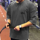 https://athlora.ca › products › mens-gym-oversized-shirt

