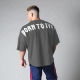 https://athlora.ca › products › mens-gym-shirt-oversized-dry-fit